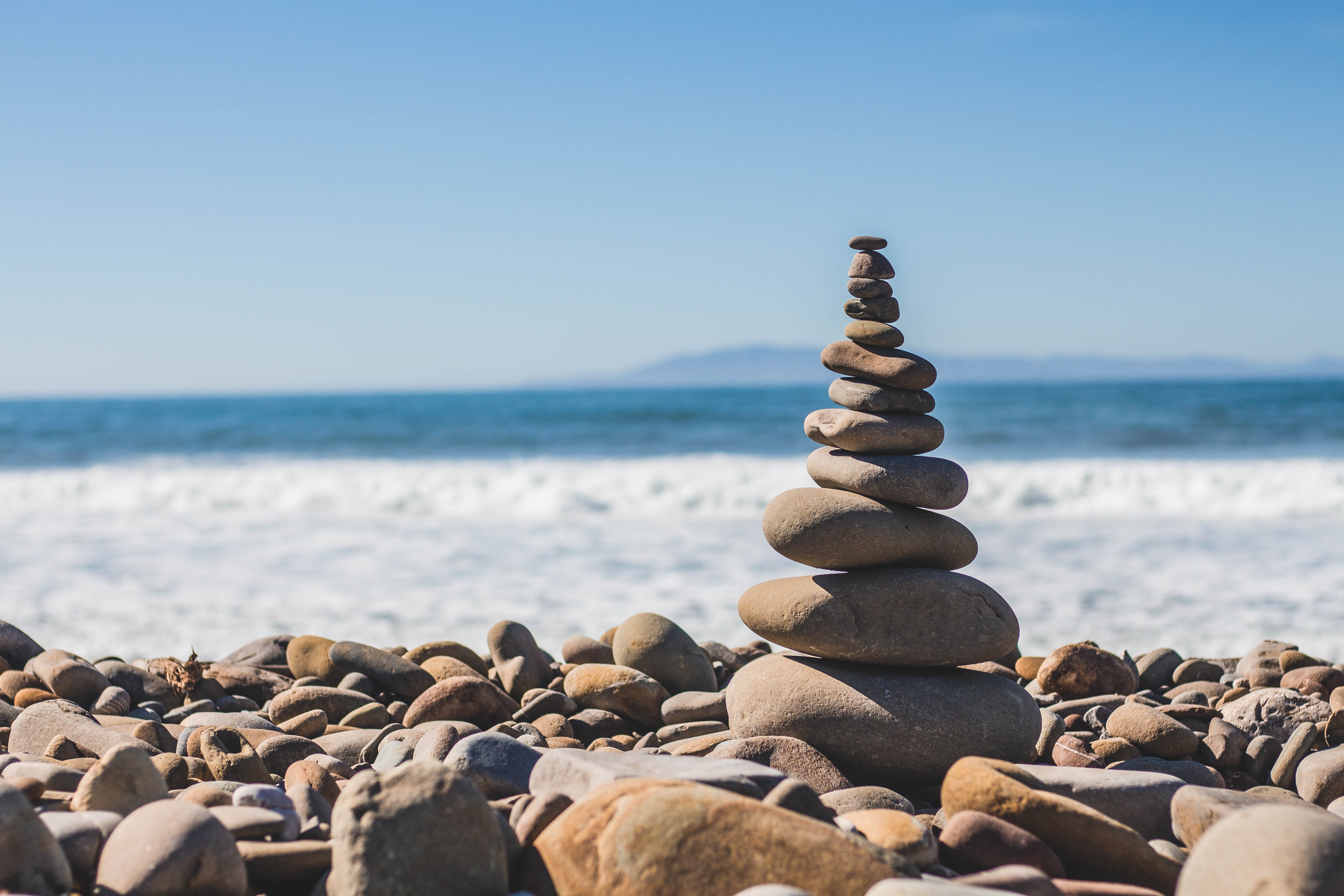 Stacked rocks on shore